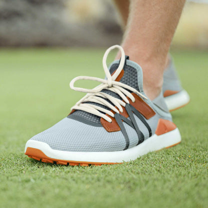 OluKai Trending | Manele Men’s Breathable Golf Shoes - Pale Moss / Molten Orange