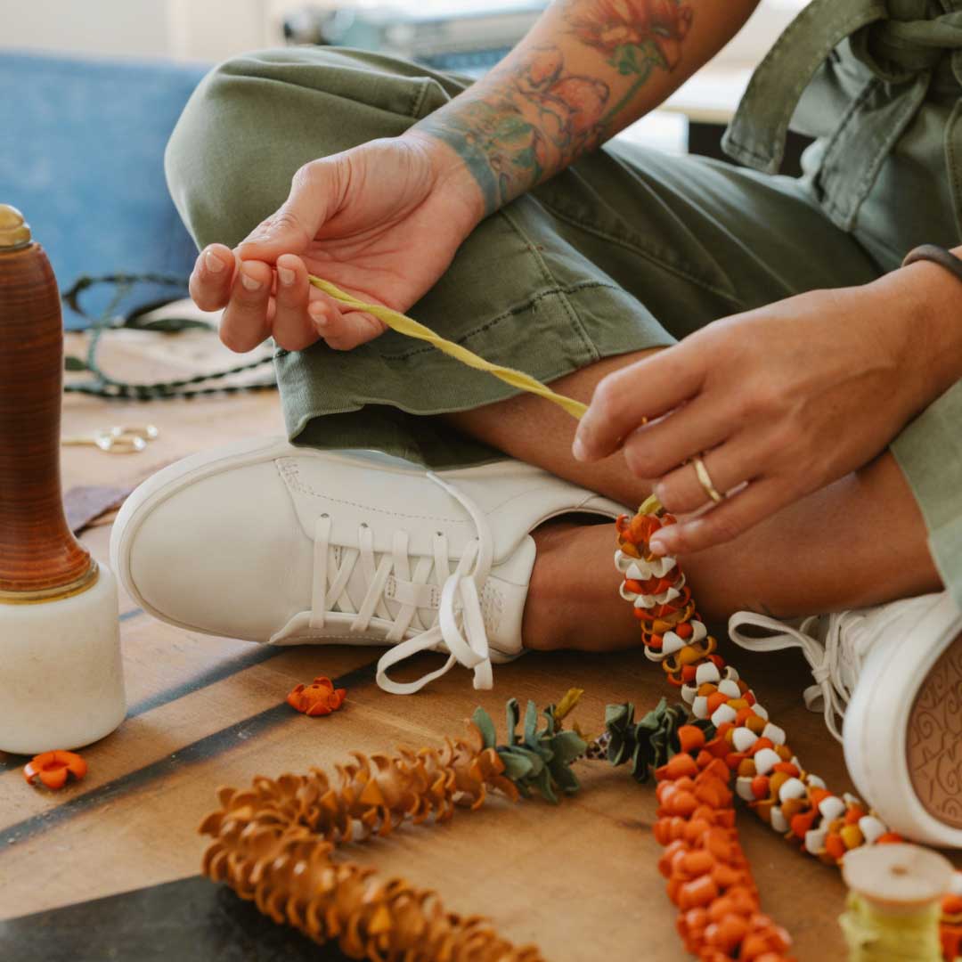 OluKai New | Pehuea Lī ‘Ili Women's Leather Sneakers - White