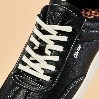 OluKai Trending | Hā‘upu Women’s Leather Sneakers - Onyx