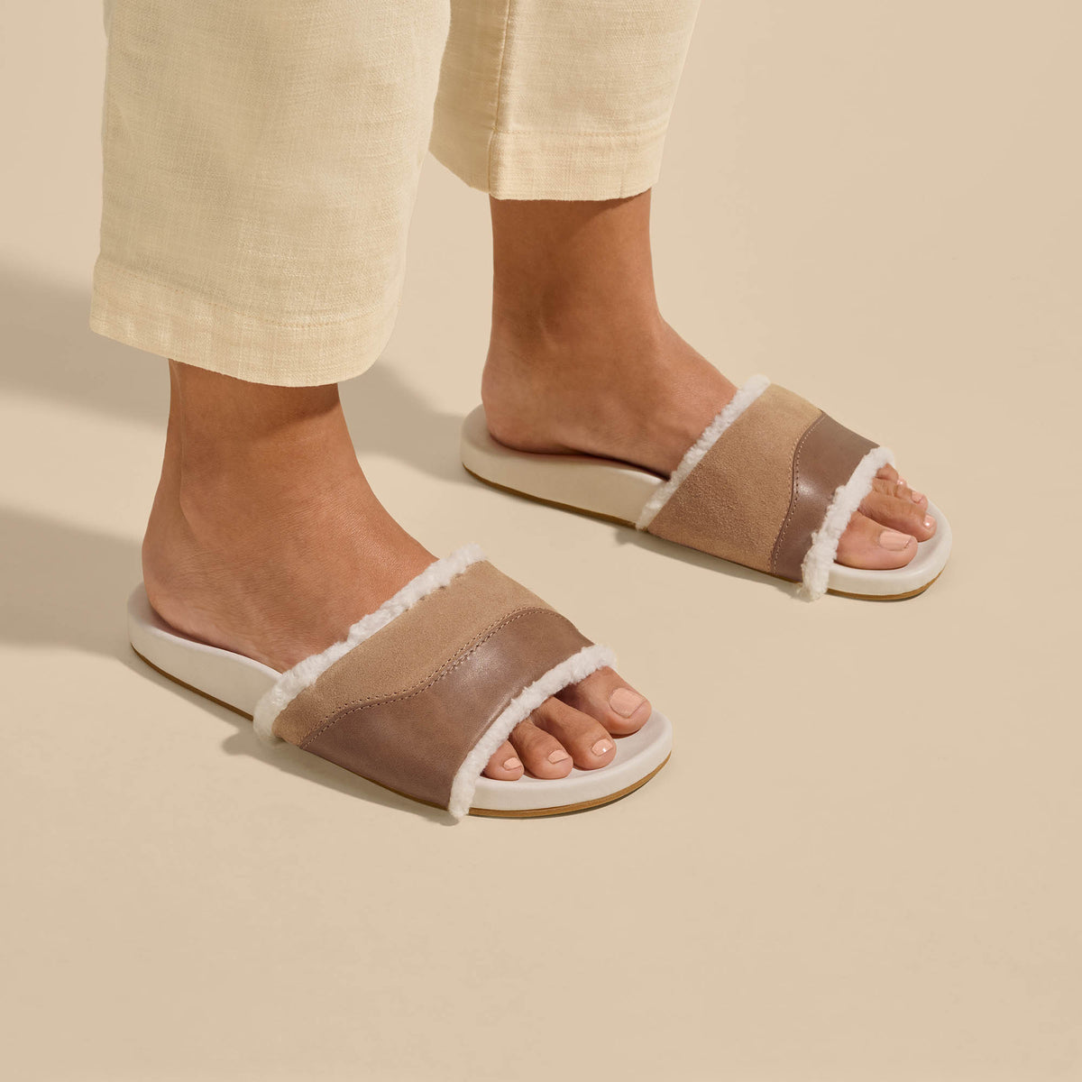 OluKai Classic | Hō‘ala Slide Women’s Slide Slipper Sandals - Tan / Puka